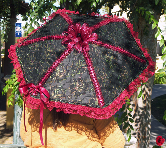 KC Dragonfly - Burgundy Boudier parasol - top - with bow tied on top